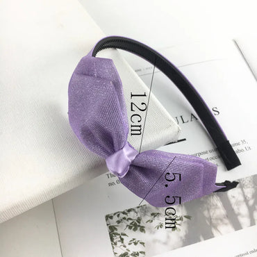 Women'S Casual Simple Style Solid Color Bow Knot Alloy Tassel Inlay Pearl Hair Band