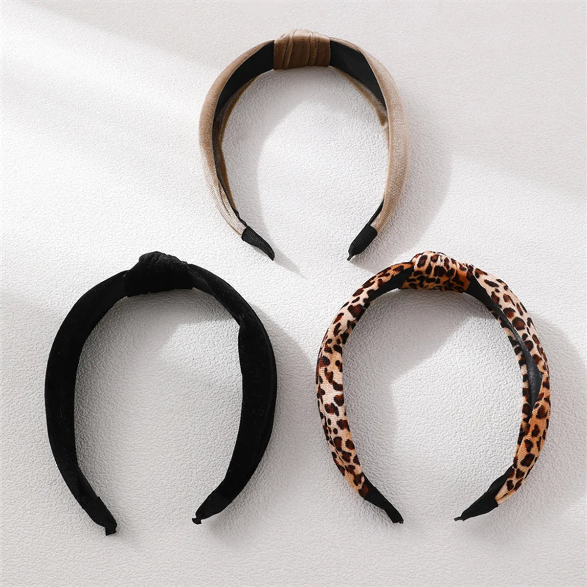 Women'S Retro Simple Style Solid Color Knot Leopard Cloth Printing Hair Band