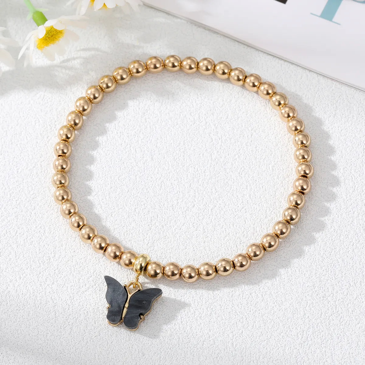 Simple Style Butterfly Alloy Beaded Resin Bracelets