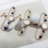 Women's Alloy And Stainless Steel Four Leaf Clover Fashion Pull Bracelet Watch With Round Dial
