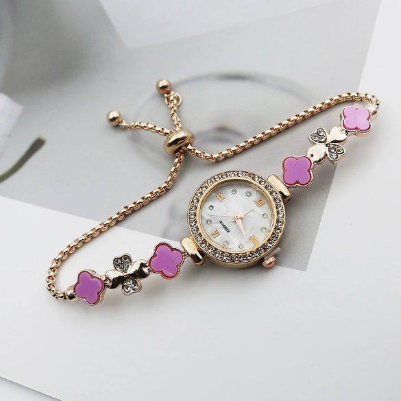 Women's Alloy And Stainless Steel Four Leaf Clover Fashion Pull Bracelet Watch With Round Dial