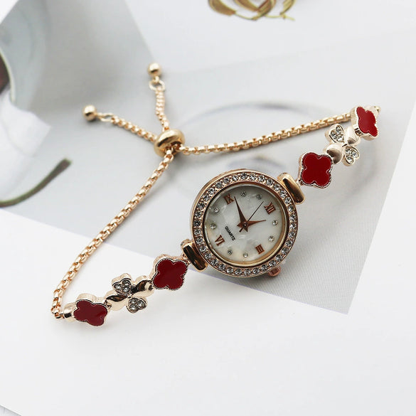 Women's Alloy And Stainless Steel Four Leaf Clover Fashion Pull Bracelet Watch With Round Dial