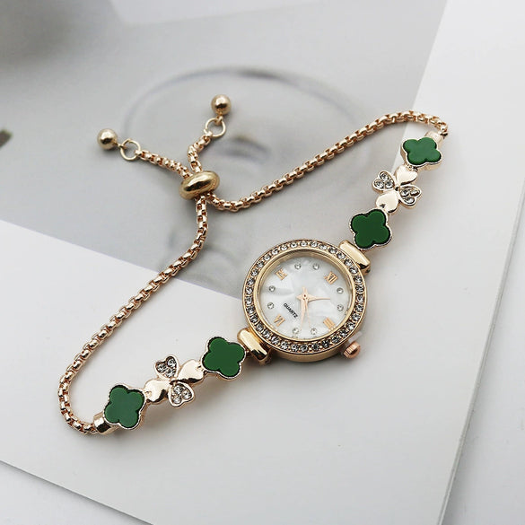 Women's Alloy And Stainless Steel Four Leaf Clover Fashion Pull Bracelet Watch With Round Dial