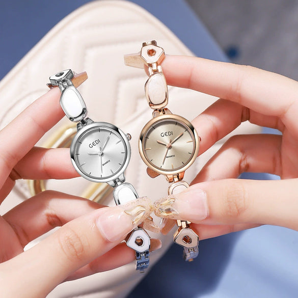 Women's Alloy Band And Case Fashion Light Luxury Disc Elegant Quartz Watch With Sun Pattern And Spiral Crown