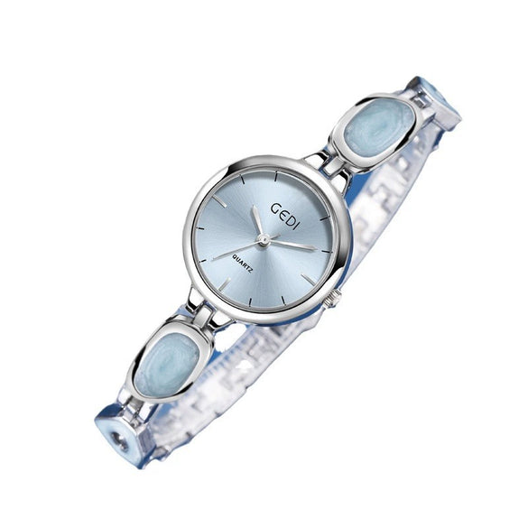 Women's Alloy Band And Case Fashion Light Luxury Disc Elegant Quartz Watch With Sun Pattern And Spiral Crown