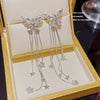 Women's Alloy Bow Star Tassel Earrings With Diamond Design