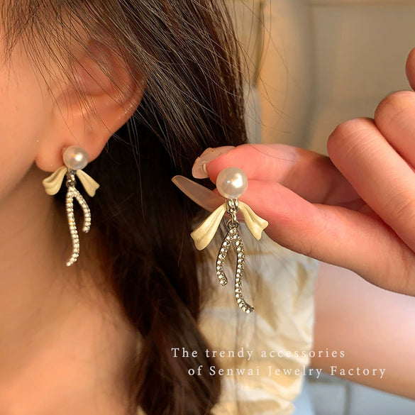 Women's Alloy Bow Tie Pearl Tassel Earrings French Retro Electroplated Light Luxury Ear Jewelry