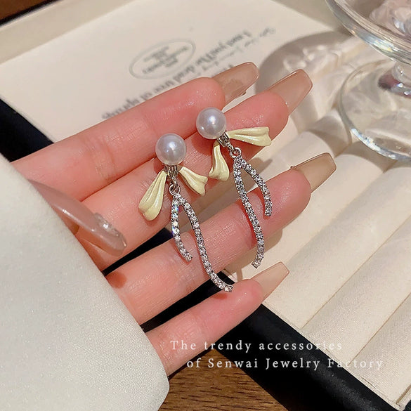Women's Alloy Bow Tie Pearl Tassel Earrings French Retro Electroplated Light Luxury Ear Jewelry