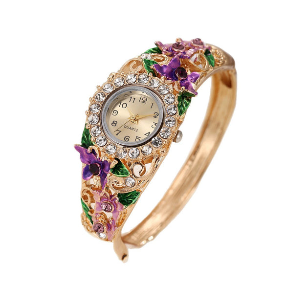 Women's Alloy Bracelet Quartz Watch With Diamonddecorated Butterfly Flower Design And Round Dial