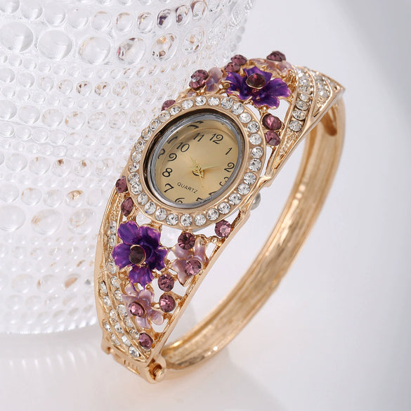 Women's Alloy Bracelet Watch With Decorative Flower And Round Dial Fashion Style