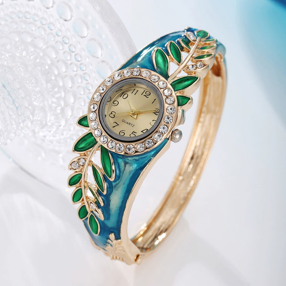 Women's Alloy Bracelet Watch With Decorative Leaf And Round Dial