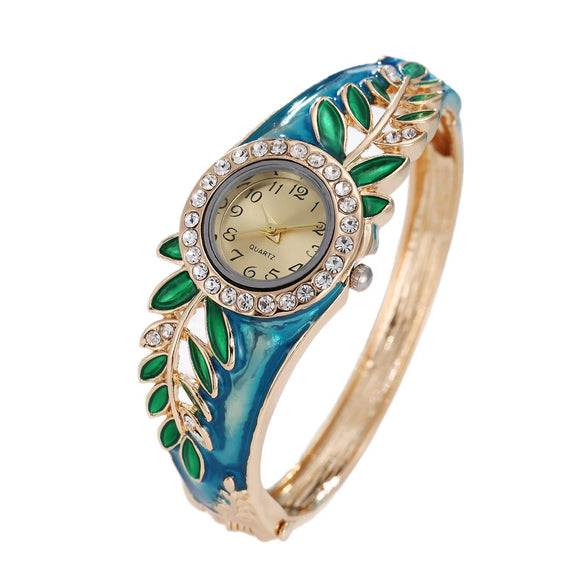 Women's Alloy Bracelet Watch With Decorative Leaf And Round Dial