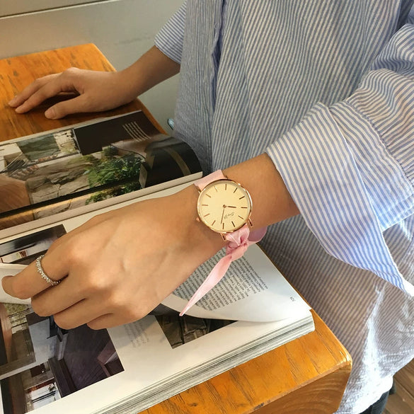 Women's Alloy Case Cloth Belt Round Dial Printed Logo Canvas Strap Leisure Watch