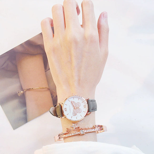 Women's Alloy Case Imitation Leather Strap Quartz Watch With Butterfly Dial And Star Bracelet Leisure Style