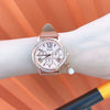 Women's Alloy Case Imitation Leather Strap Round Dial Casual Fashion Watch With Printed Logo