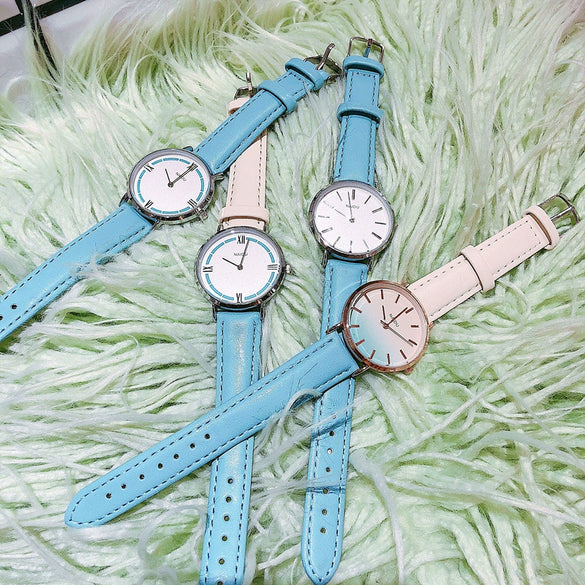 Women's Alloy Case Imitation Leather Strap Round Dial Watch With Printed Logo Retro And Leisure Style