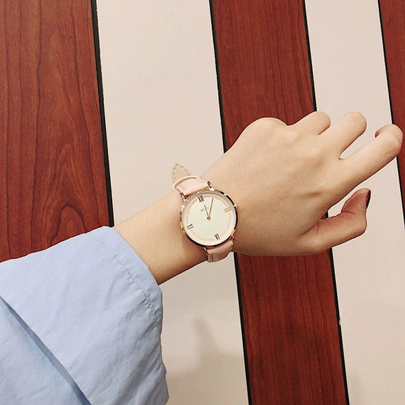 Women's Alloy Case Imitation Leather Strap Round Dial Watch With Printed Logo Retro And Leisure Style