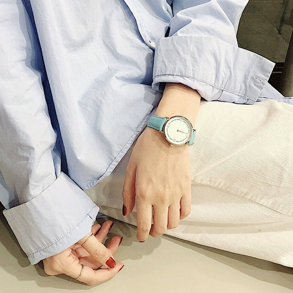 Women's Alloy Case Imitation Leather Strap Round Dial Watch With Printed Logo Retro And Leisure Style