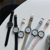 Women's Alloy Case Ordinary Glass Mirror Pointer Quartz Watch With Simple Elegant White Belt And Leisure Style