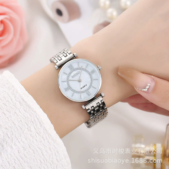 Women's Alloy Case Steel Band Round Dial Casual Quartz Wristwatch
