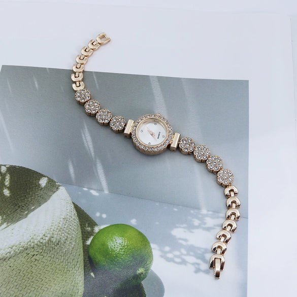 Women's Alloy Casual Quartz Bracelet Watch With Round Dial And Stainless Steel Buckle