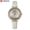Women's Alloy Leather Casual Round Waterproof Quartz Watch With Pin Buckle And Onion Crown