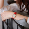 Women's Alloy Leather Gold Clasp Oval Dial Fashion Waterproof Quartz Watch