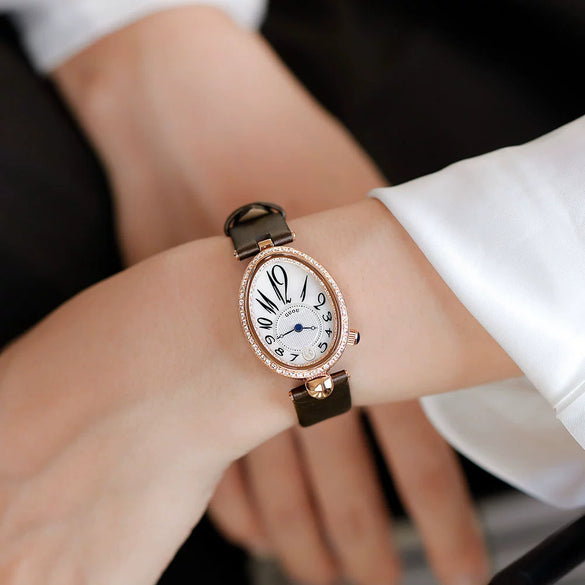 Women's Alloy Leather Gold Clasp Oval Dial Fashion Waterproof Quartz Watch