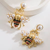 Women's Alloy Pearl Inlaid Heart Devil's Eye Earrings With 925 Silver Needle