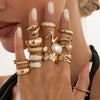 Women's Alloy Plated Imitation Pearl Sunflower Ring Set With Smooth Teardrop Stacked Rings And Geometric Floral Designs