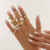 Women's Alloy Plated Imitation Pearl Sunflower Ring Set With Smooth Teardrop Stacked Rings And Geometric Floral Designs