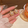 Women's Alloy Retro Minimalist Golden Flower Electroplated Earrings