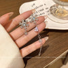 Women's Alloy 925 Silver Electroplated Asymmetric Snowflake Flower Tassel Earrings Light Luxury High End Temperament