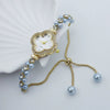 Women's Alloy Strap Flower Shape Fashion Watch With Pearl Diamond Four Leaf Clover Design