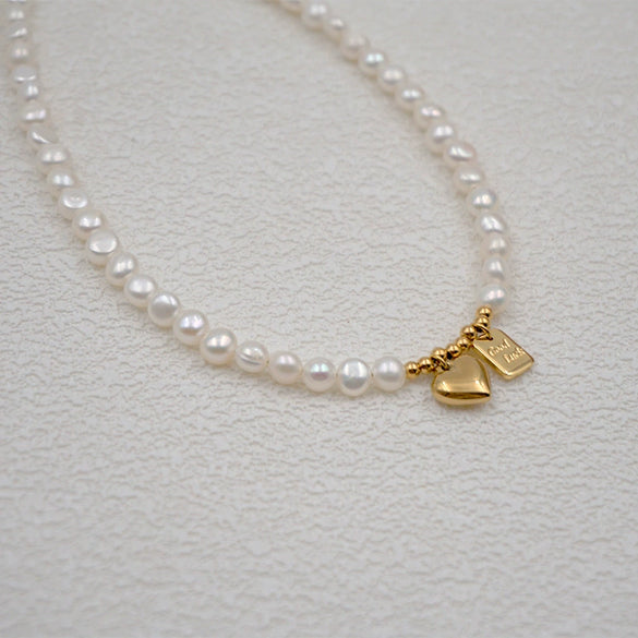 Women's Baroque Freshwater Pearl And Titanium Steel Geometric Handmade Pendant Necklace With Cross Chain