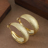 Women's Bold Geometric Frosted Metal Hoop Earrings With Gold Plated Finish Statement Fashion Jewelry