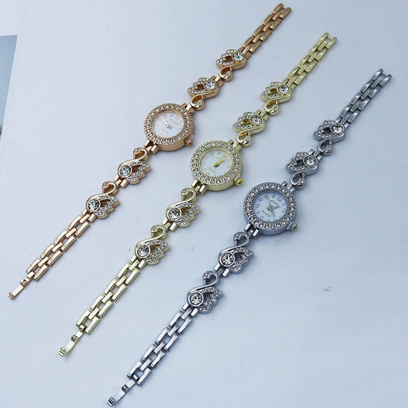 Women's Casual Quartz Bracelet Watch Alloy Material Round Dial
