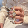 Women's Casual Round Dial Alloy Case Pearl Bracelet Watch With Stainless Steel Jewelry Buckle