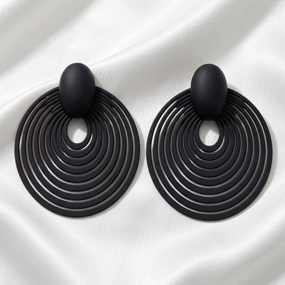 Women's Copper Alloy Circular Geometric Stud Earrings With Electroplated Metallic Finish And Exaggerated Fashion Style