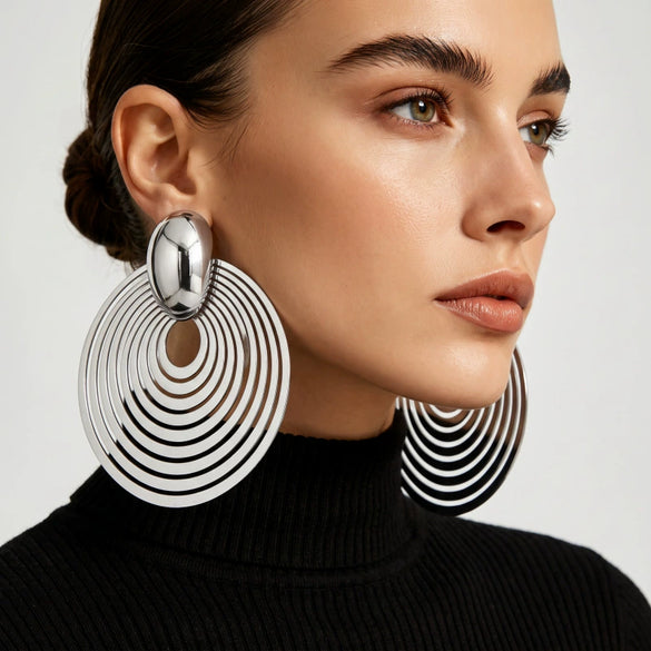 Women's Copper Alloy Circular Geometric Stud Earrings With Electroplated Metallic Finish And Exaggerated Fashion Style