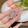 Women's Copper Bow Zirconia Earrings