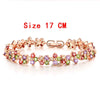 Women's Copper Four Leaf Clover Bracelet With Colorful Zircon Inlay And Gold Tone Leaf Design