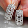 Women's Copper Hollow Carved Flower Zirconia Earrings