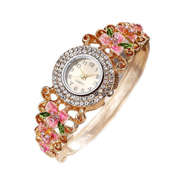 Women's Diamonddecorated Carved Flower Quartz Watch Hollow Alloy Bracelet Round Dial Fashion