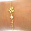 Women's Electroplated Alloy Bracelet With Imitation Pearl And Leaf Chain Geometric Floral Light Luxury Style