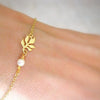 Women's Electroplated Alloy Bracelet With Imitation Pearl And Leaf Chain Geometric Floral Light Luxury Style