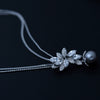 Women's Electroplated Copper Flower Pendant Necklace With Shell Pearl And Zircon Accents