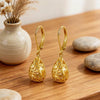 Women's Electroplated Copper Hollow Heart Drop Pendant Earrings With Glossy Three Dimensional Design And Elegant Literary Style