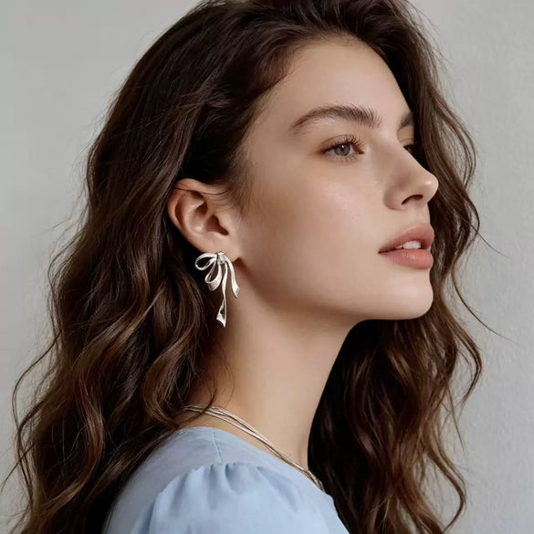 Women's Electroplated Metal Bow Tassel Earrings With Zircon Accents Simple Ribbon Style Artistic Jewelry