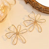 Women's Electroplated Metal Flower Earrings With Hollow Statement Design And Stainless Steel Ear Posts For Wholesale Fashion Jewelry